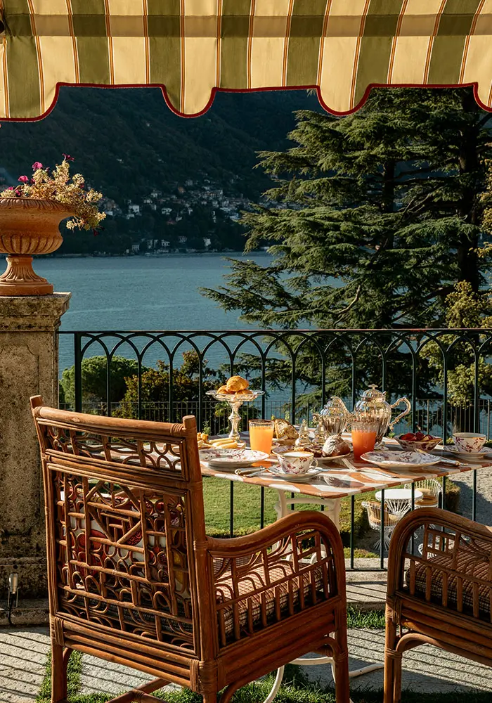 Detail of the exterior dining terrace at Villa Passalacqua, overlooking Lao di Como.