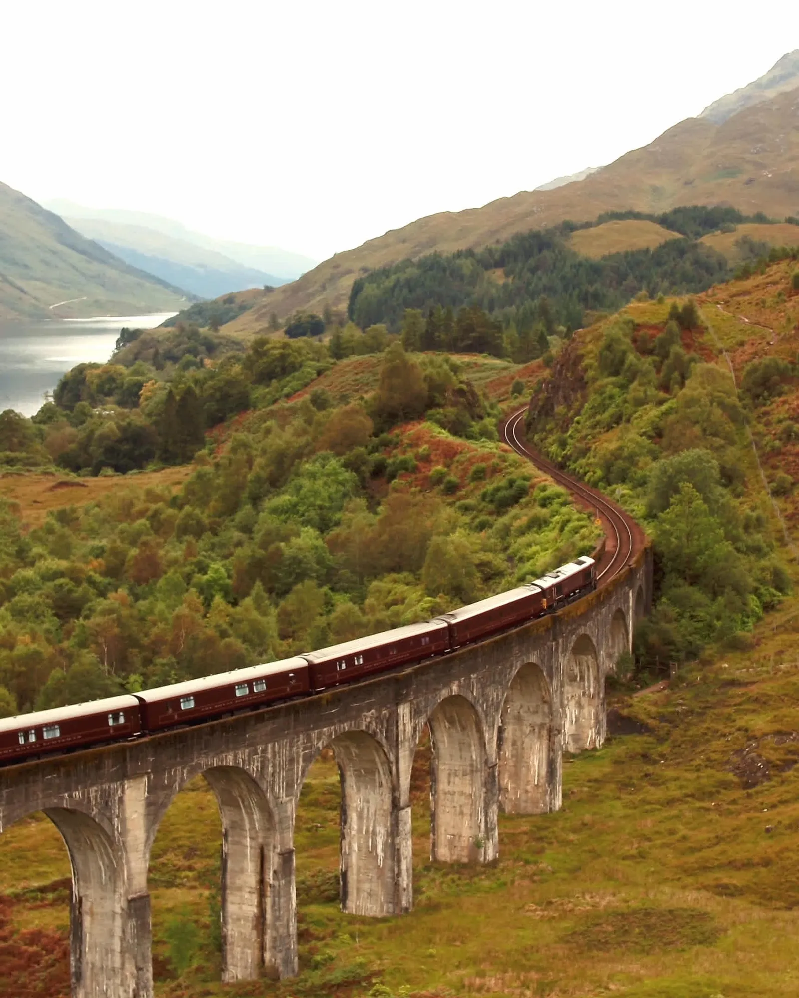 The Belmond Royal Scotsman crossing the Glenfinnan Viaduct